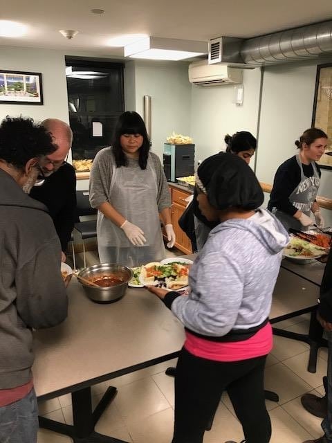 Corporate Volunteer Team from Smart Design cooked and served clients on MLK -Day in Cluster House NYC.