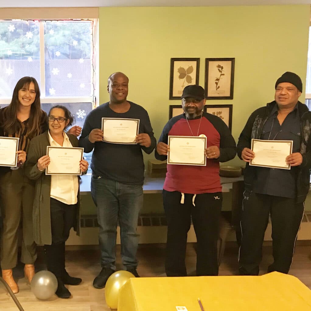 Wellness Self-Management Group Participants receive their certificates of completion.